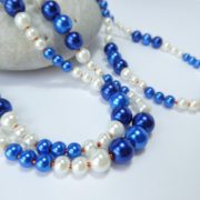 Sautoir bleu et blanc avec Miyuki orange.