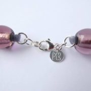 Le fermoir et la marque PMLS du collier Apolline.